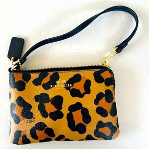 Coach wristlet cheetah print